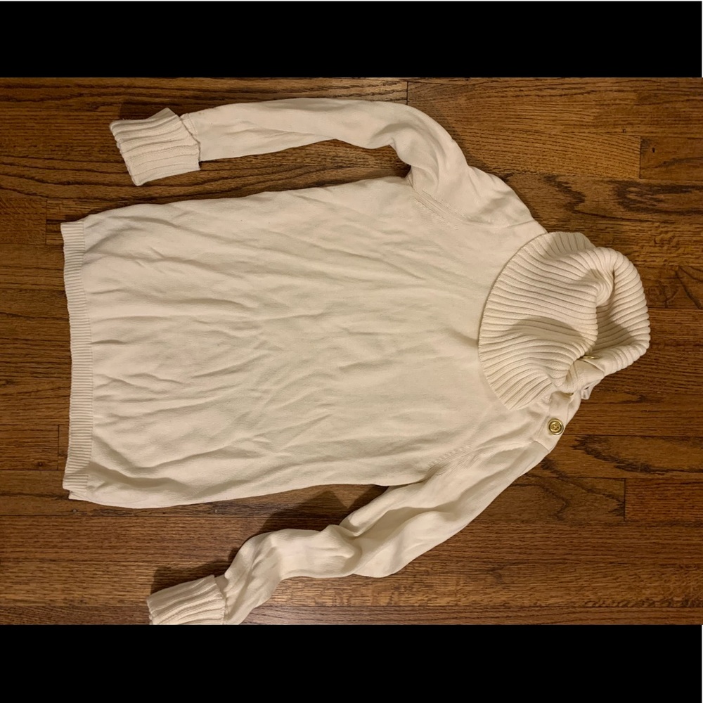 White turtleneck with gold detailing